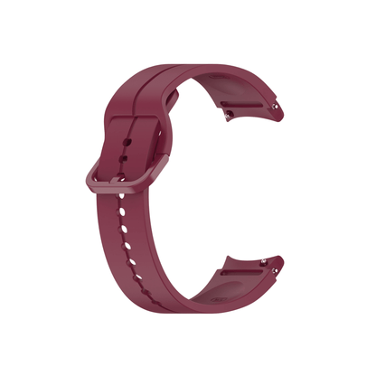 Smartwatch mit montiertem Armband in Bordeauxrot – kräftige Farbe mit Charakter.