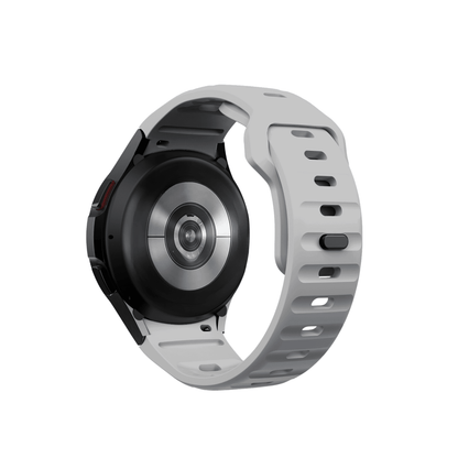 Hellgraues Fit Pulse Armband – atmungsaktiv, leicht und perfekt für aktive Trägerinnen und Träger.